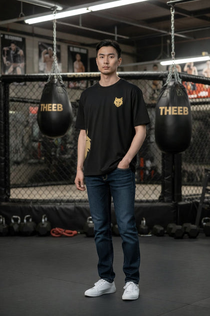 My Store black polyester t-shirt with gold wolf logo, short sleeves, crew neck, for athletic wear.