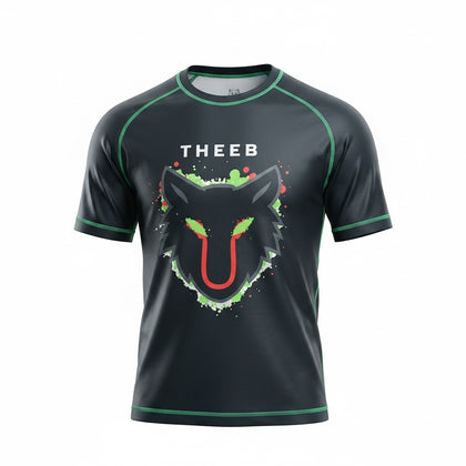 THEEB kids short-sleeve rash guard in black with neon wolf graphic and green stitching for MMA and BJJ