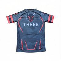 My Store THEEB Back to Basic Flashy kids rash guard, dark grey with red accents and camouflage pattern. Features a wolf logo.