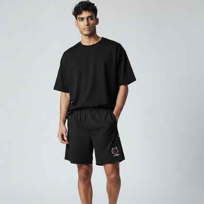 My Store black polyester-spandex gym shorts with elastic waist and wolf logo detail. Designed for training.