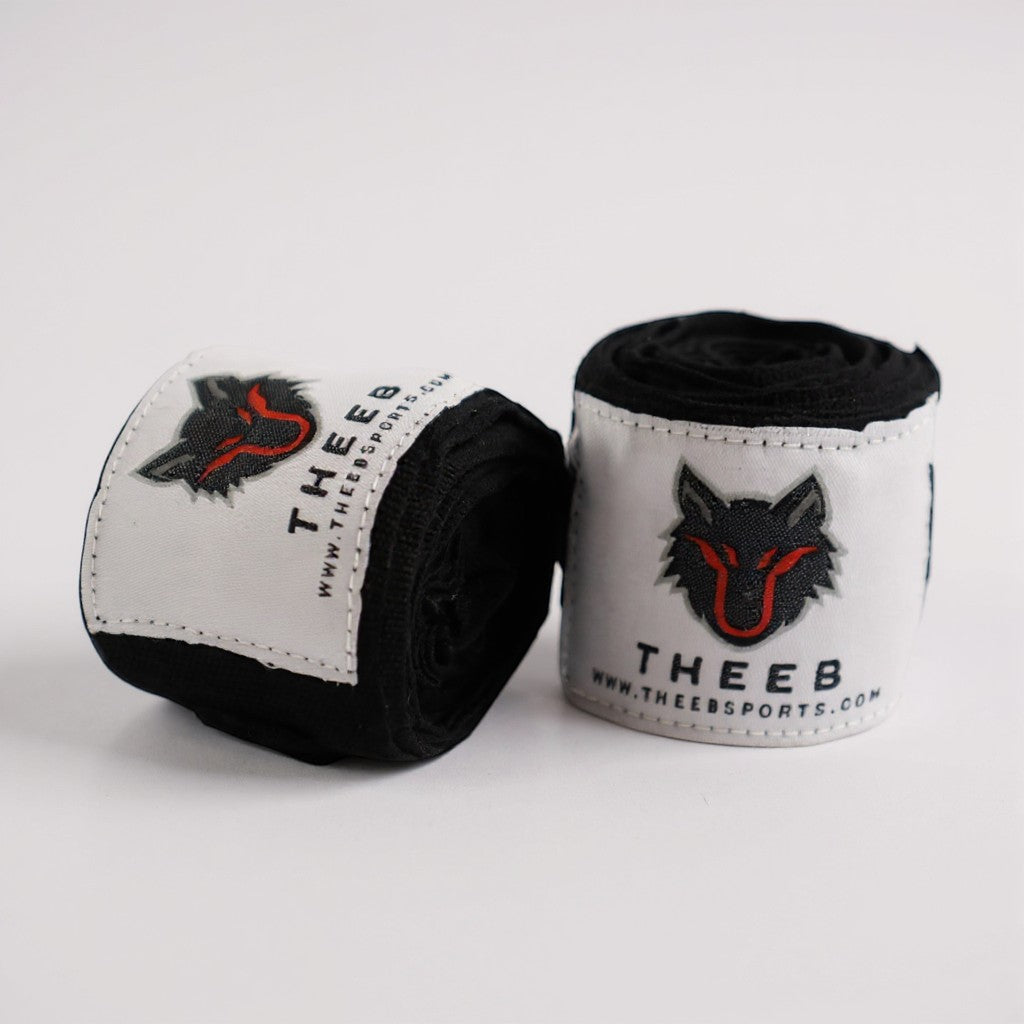 My Store THEEB black hand wraps with white label featuring a wolf logo and website address. Ideal for boxing, MMA, and combat sports.