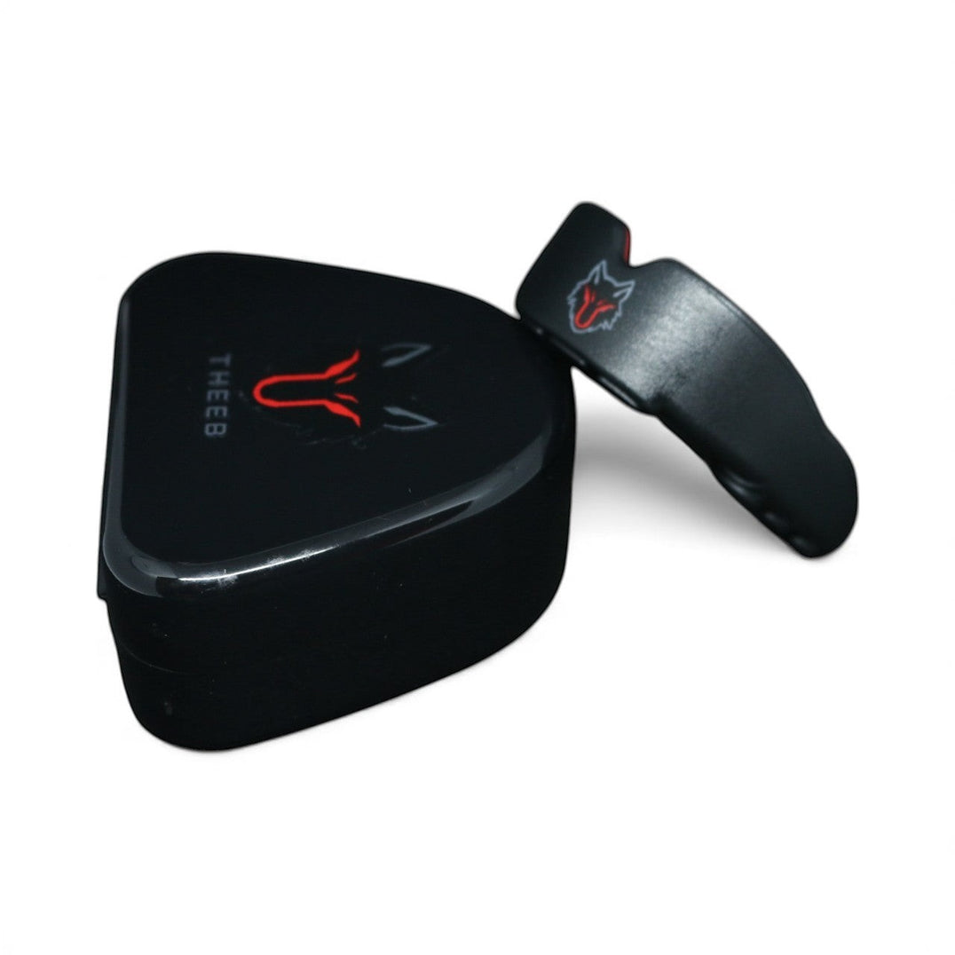 THEEB black shock-absorbing mouth guard with red wolf logo and protective case for MMA, boxing, BJJ.