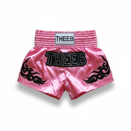 My Store THEEB Glorify pink satin Muay Thai shorts with black flame details and elastic waistband.