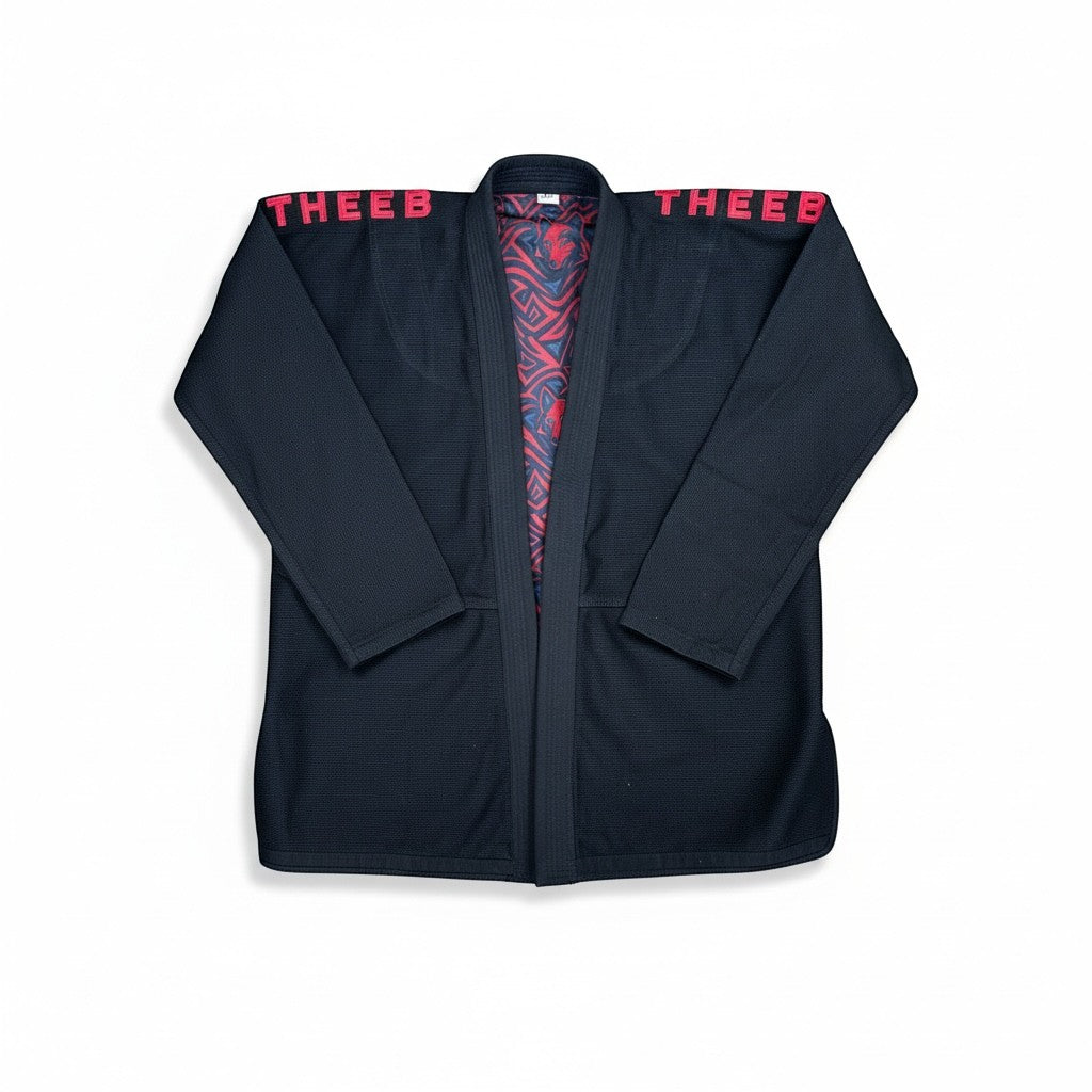 My Store THEEB Kids BJJ Gi in navy blue 450 GSM cotton with red embroidery and wolf lining. Ideal for training and competition.