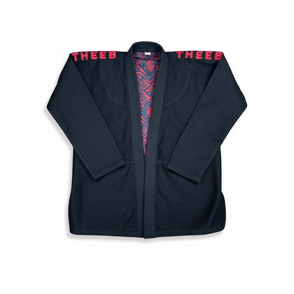 My Store THEEB Kids BJJ Gi in navy blue 450 GSM cotton with red embroidery and wolf lining. Ideal for training and competition.