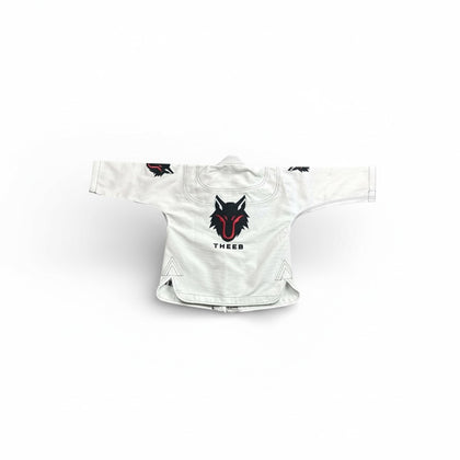 My Store THEEB Kids BJJ Gi, white 450 GSM cotton kimono with embroidered wolf logos and "THEEB" text.