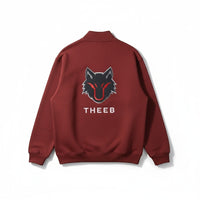 My Store THEEB maroon zip-up workout jacket with stand collar and embroidered wolf logo.